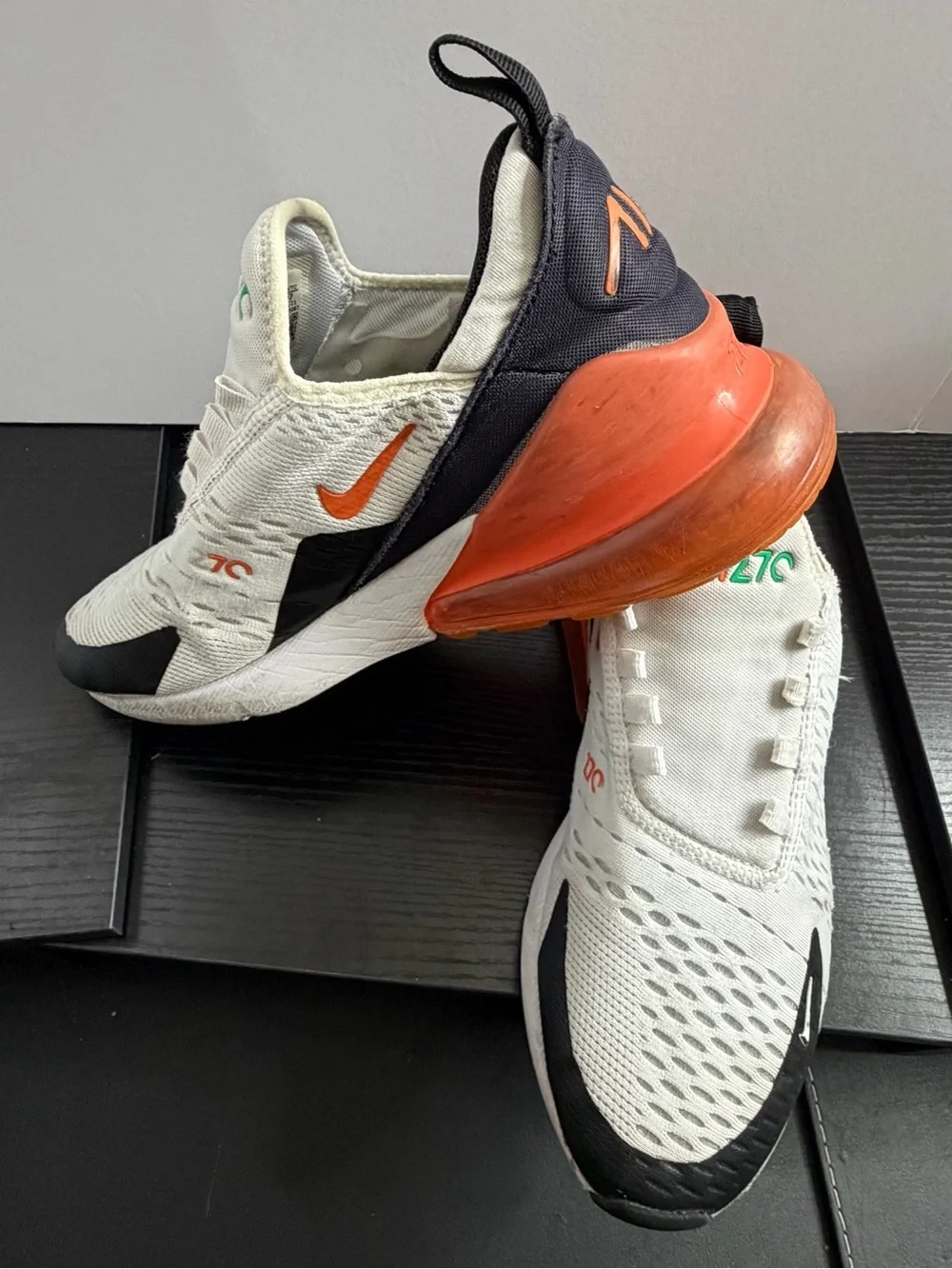 Nike Kids White Sneakers with Black, Orange and Green Accents